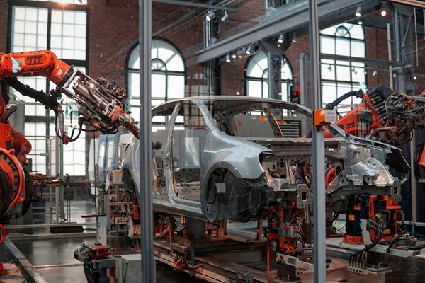 Car body on a robotic assembly line in an automotive plant
